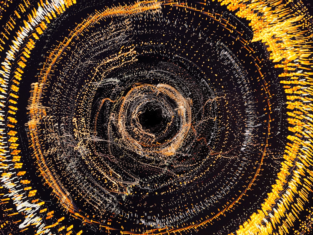 uma imagem abstrata de um buraco negro com linhas amarelas e brancas