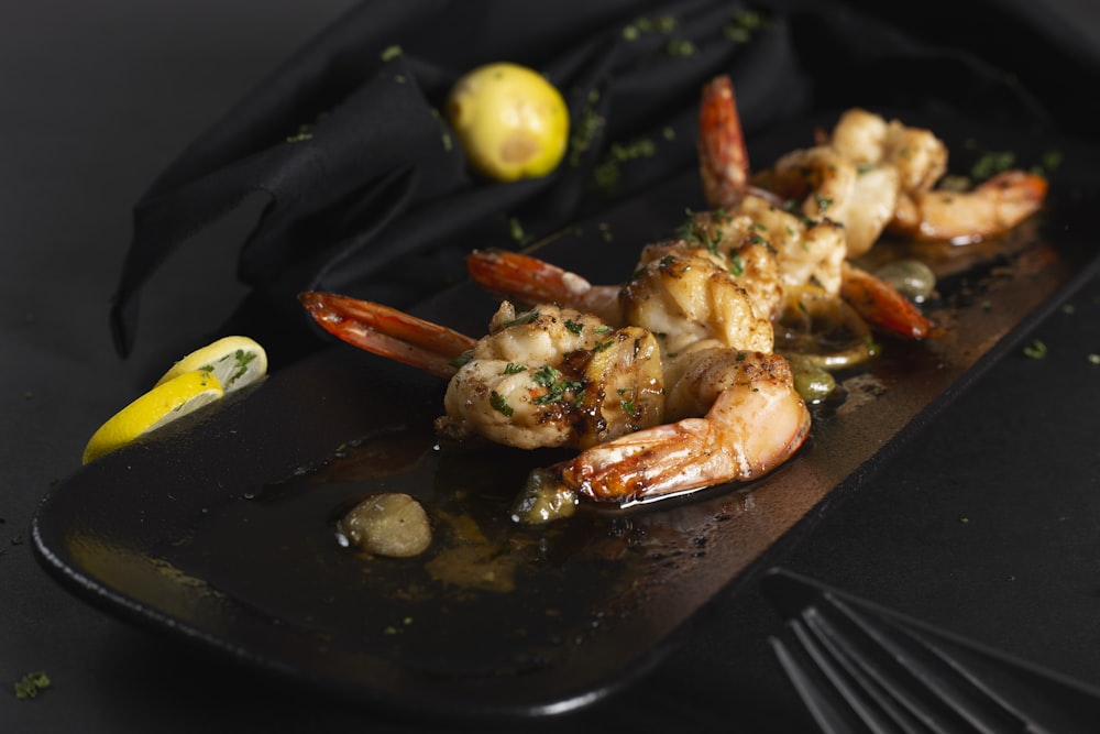 a close up of a plate of food with shrimp