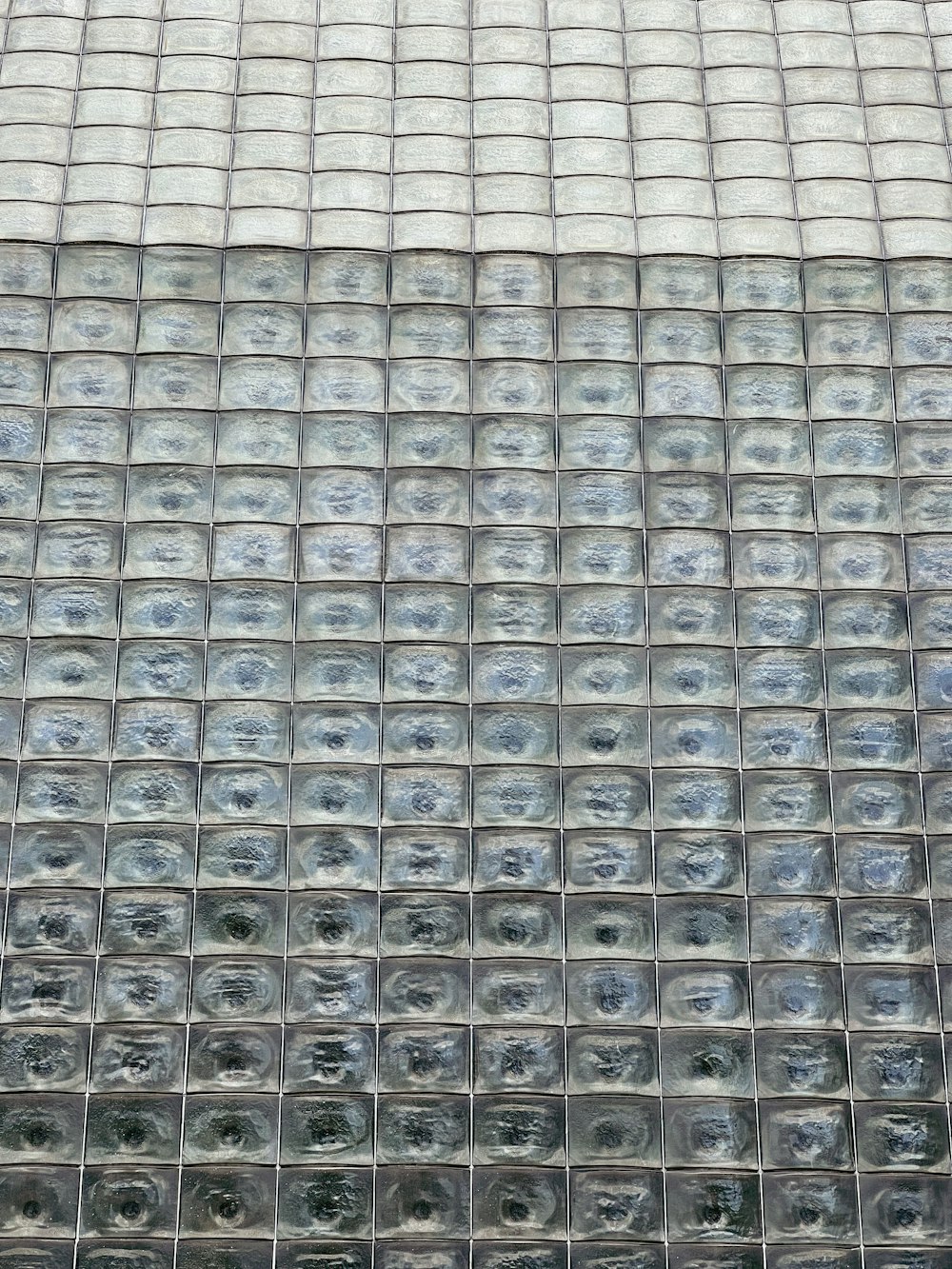 a close up of a glass block wall