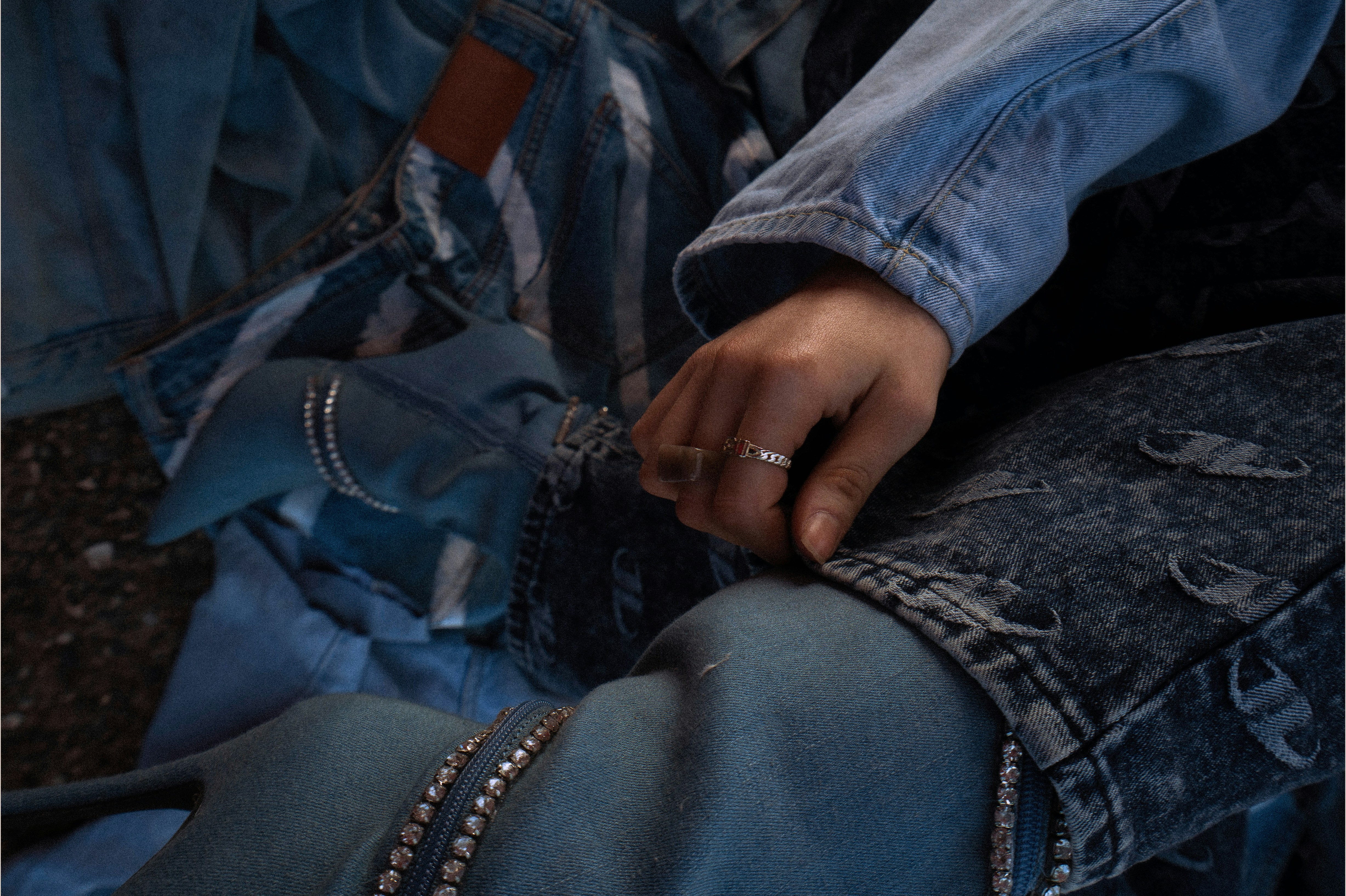 a person with a ring on their finger