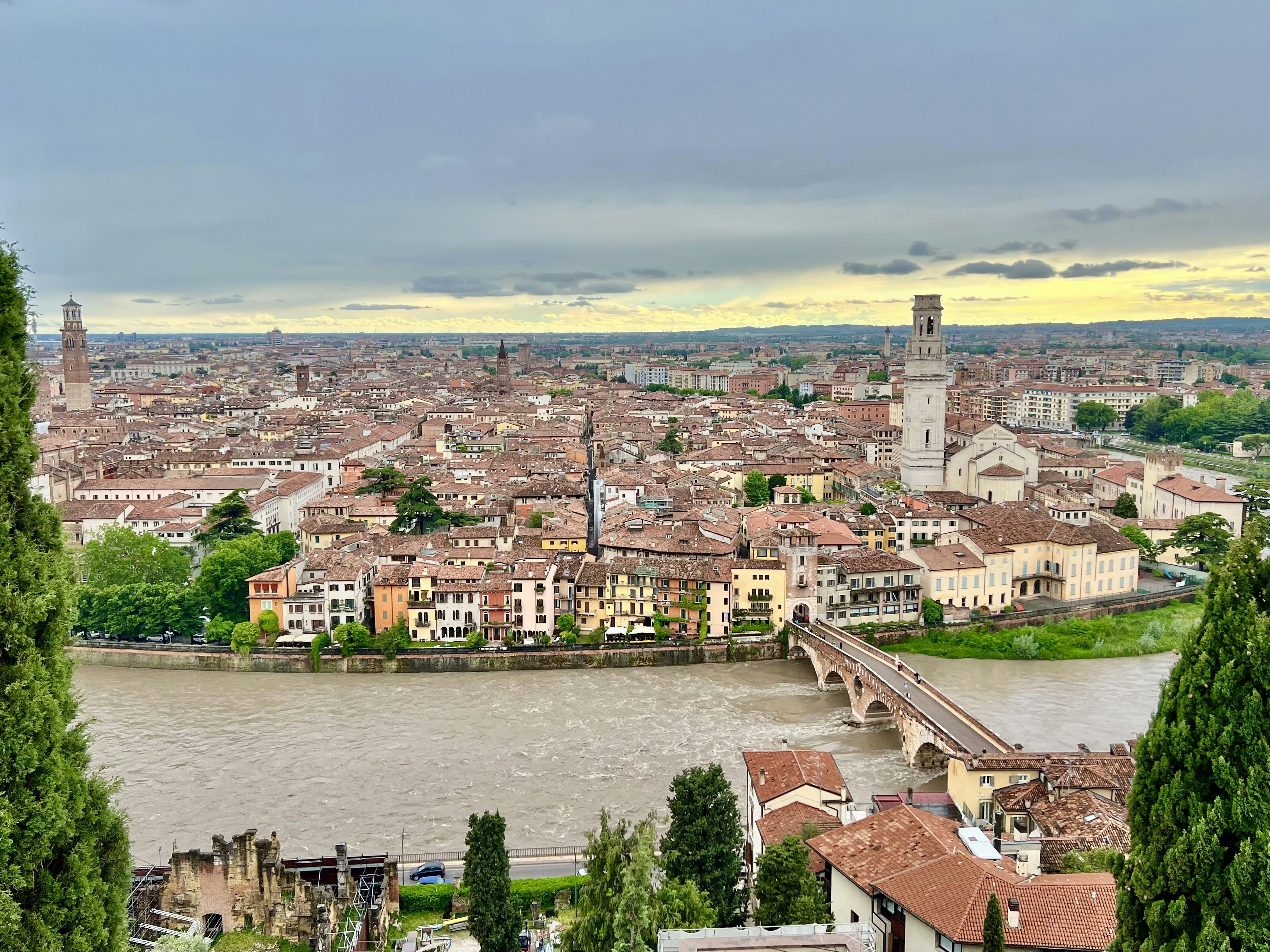a river running through a city next to a bridge