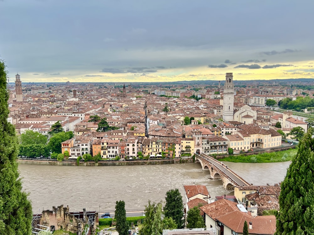 a river running through a city next to a bridge