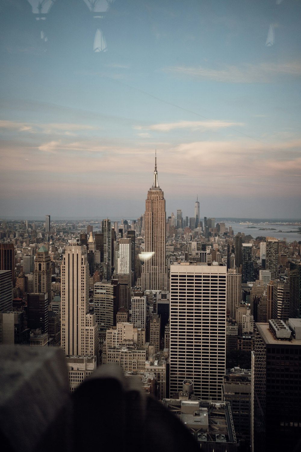 a view of a city from the top of a building