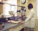 Laboratory setting showing a scientist examining lab animals fed with Saflab Nutrition diets.