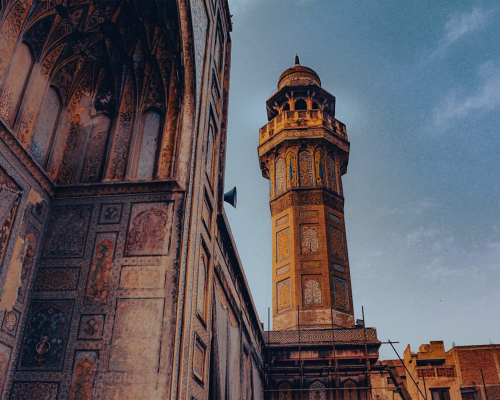 a tall clock tower towering over a city