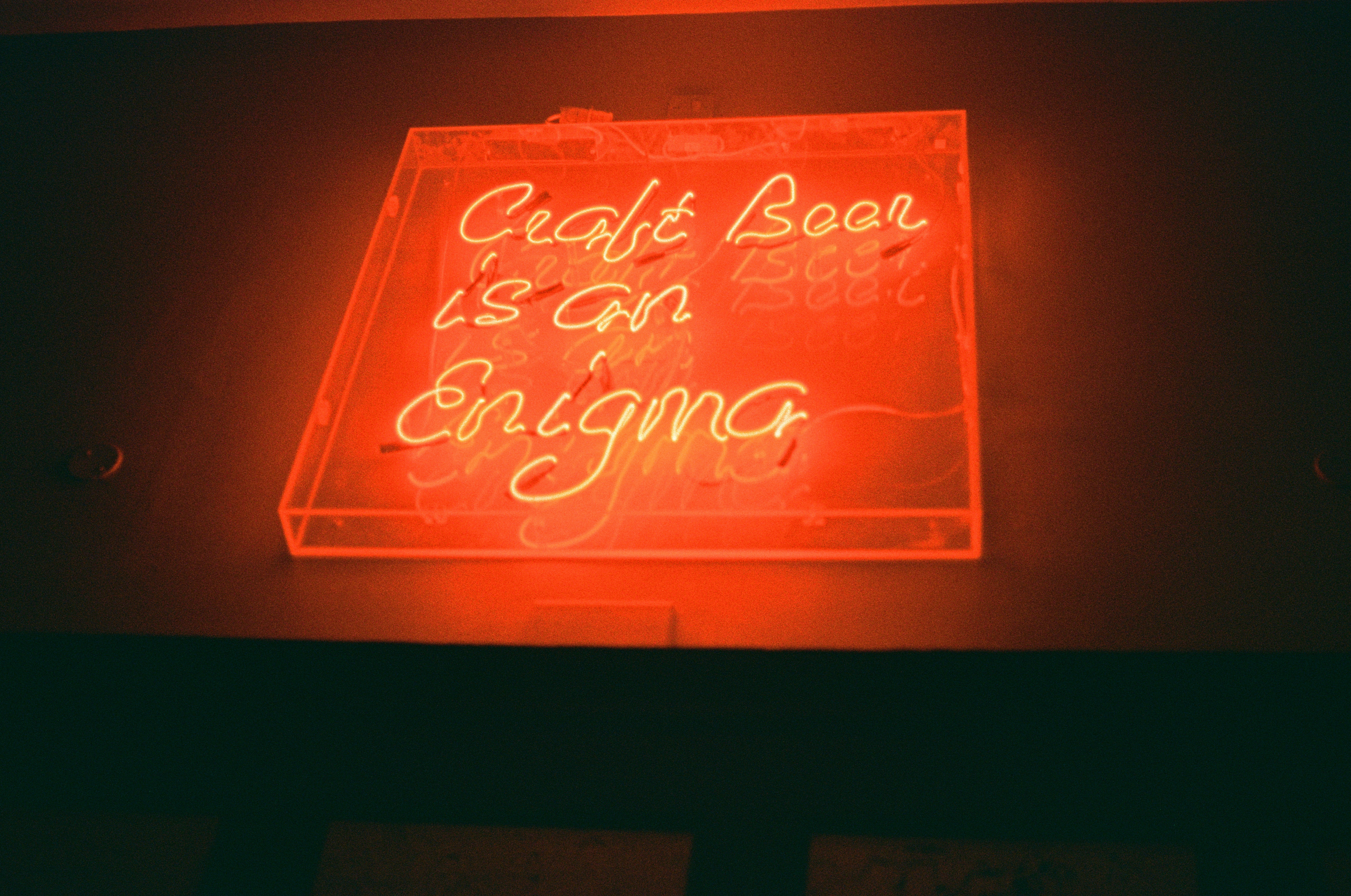 a neon sign that reads caught is an engine