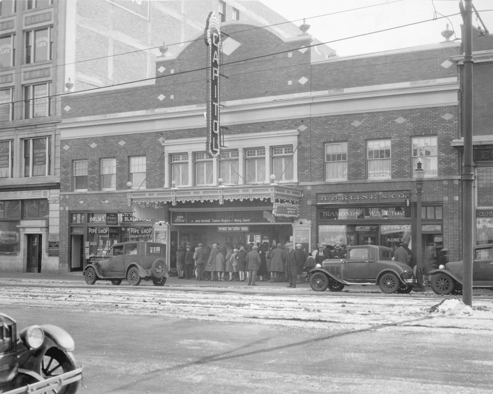 an old black and white photo of a city street