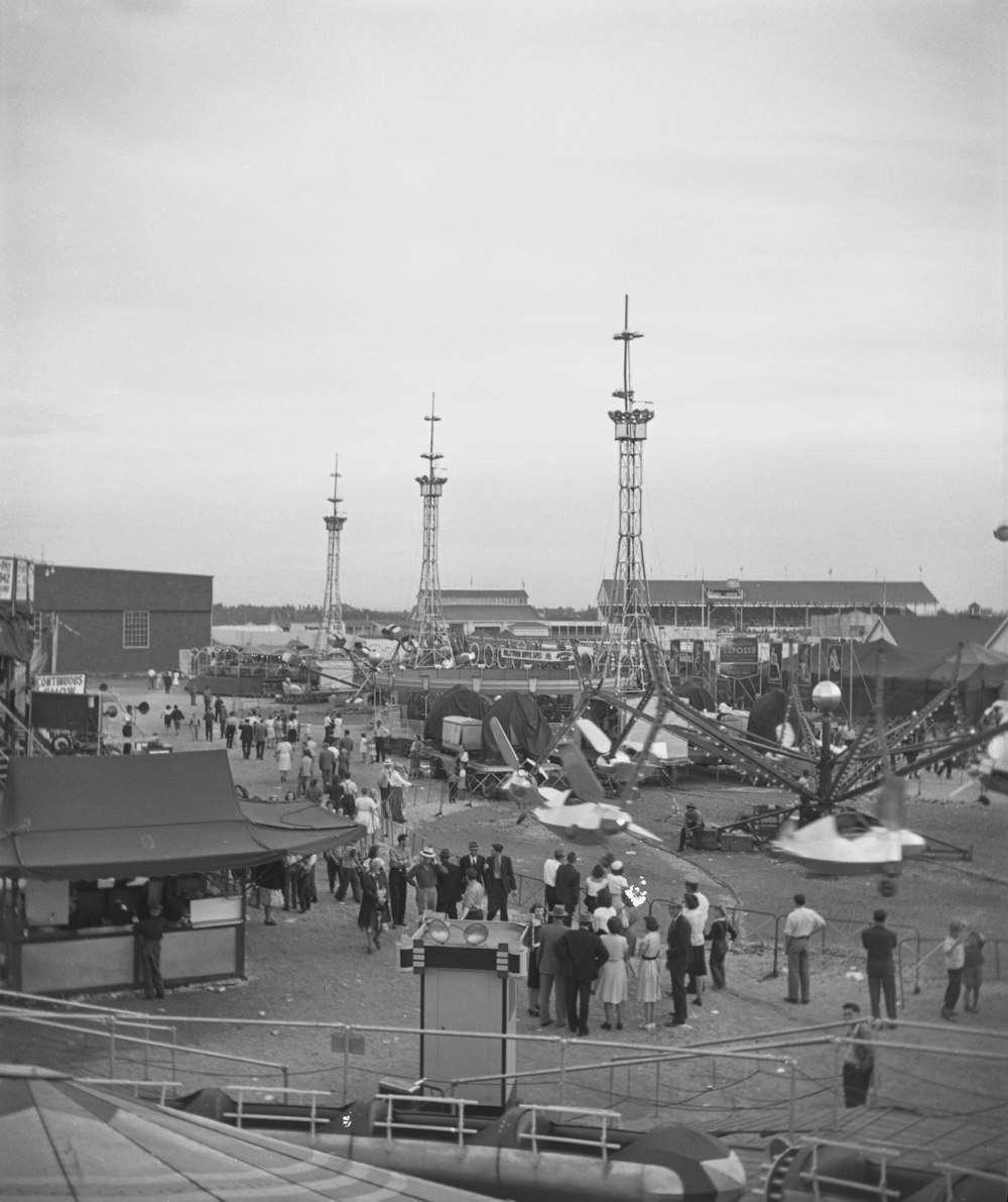 a black and white photo of a crowd of people