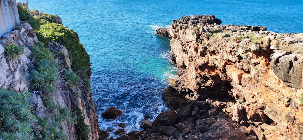 a view of the ocean from the top of a cliff