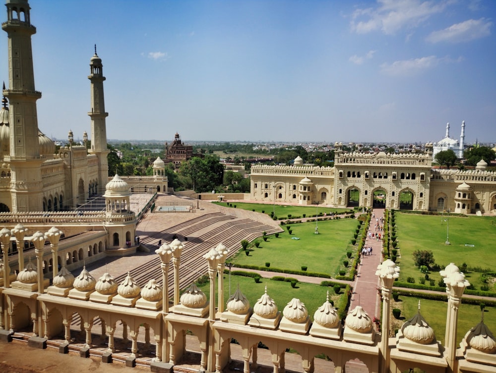 a view of a large building with a lawn in front of it