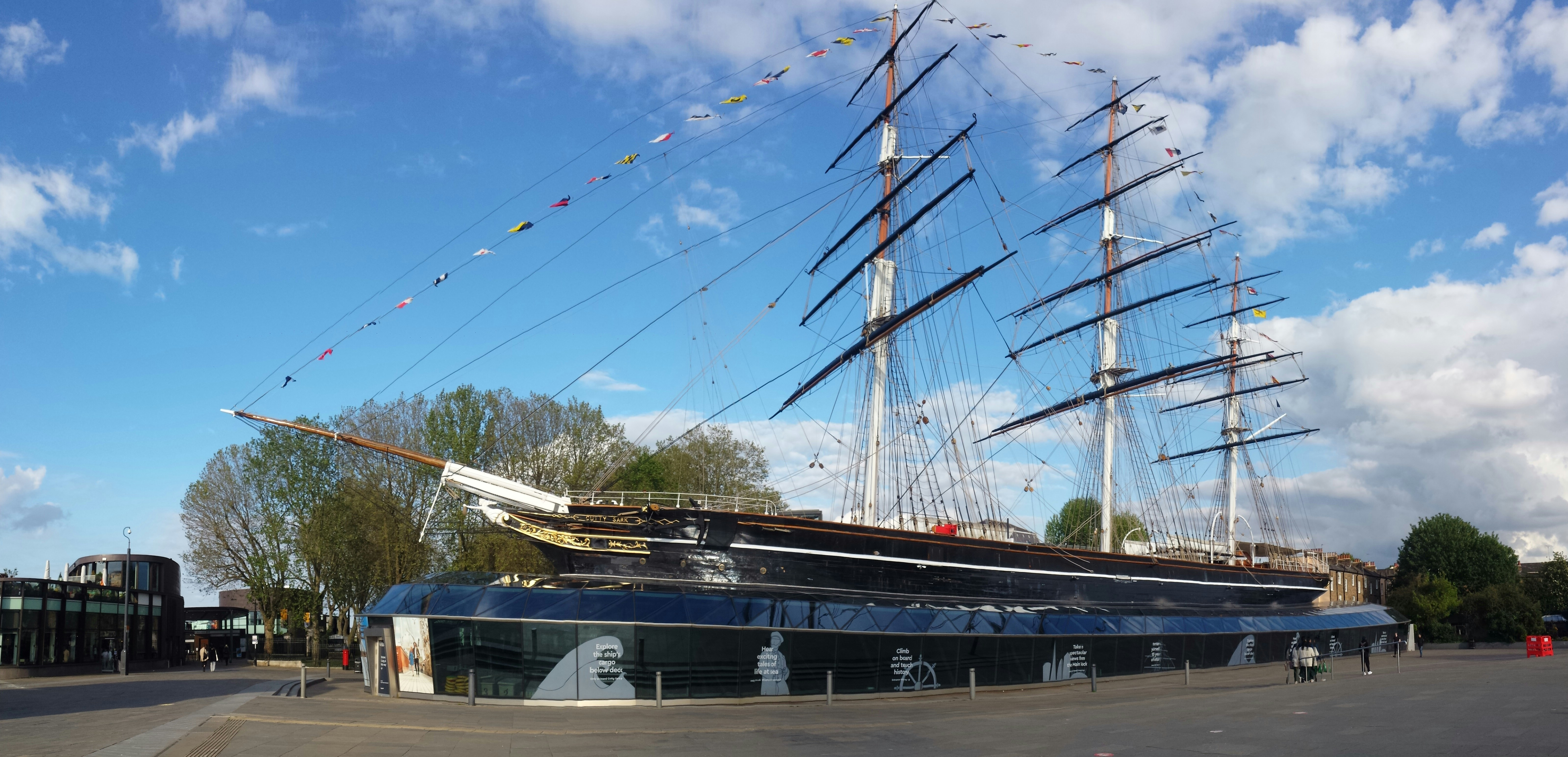 a large boat is docked at a dock