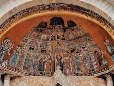 Close-up of intricate mosaic details on a Tirana building, capturing the city’s rich culture.