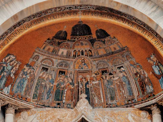 Close-up of intricate mosaic details on a Tirana building, capturing the city’s rich culture.