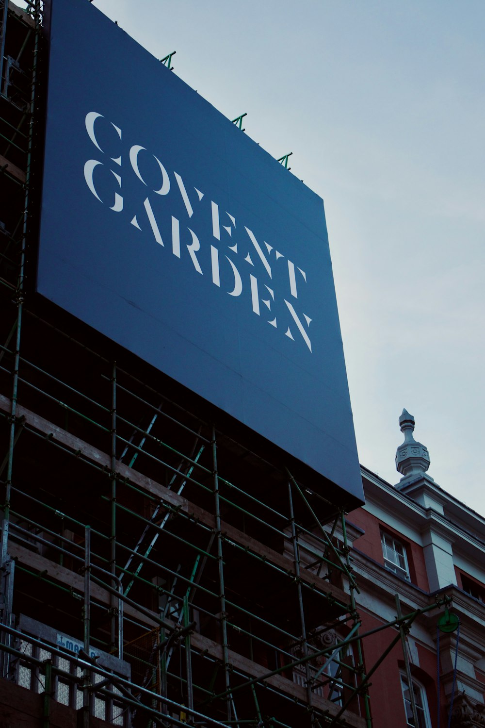 a large sign on a building under construction