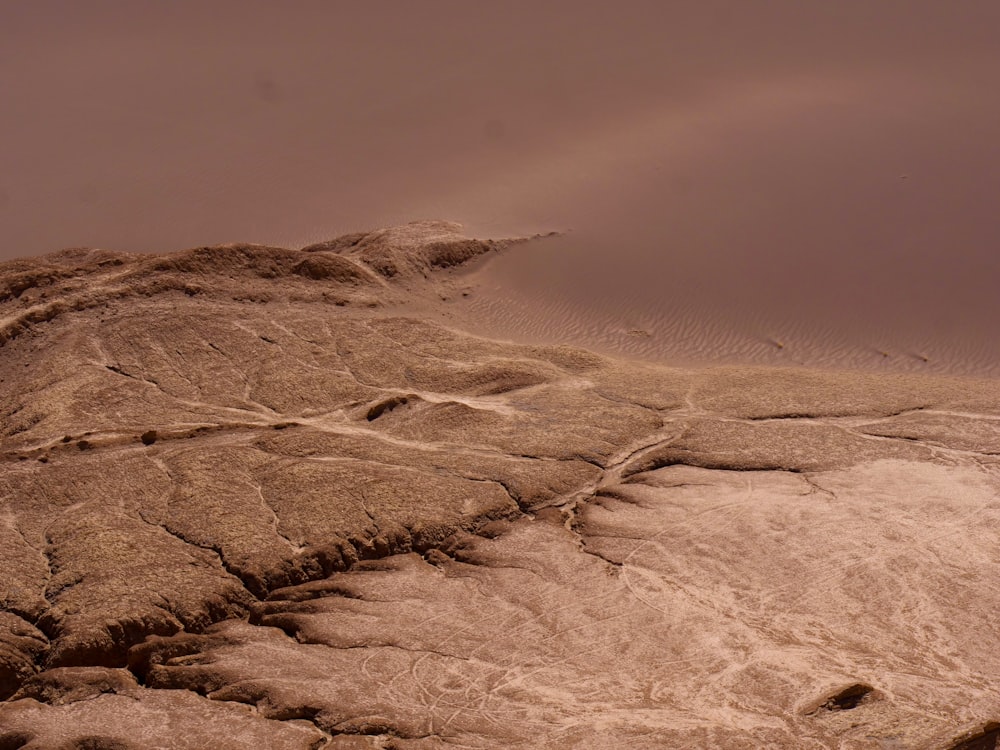 a rock formation in the middle of a desert