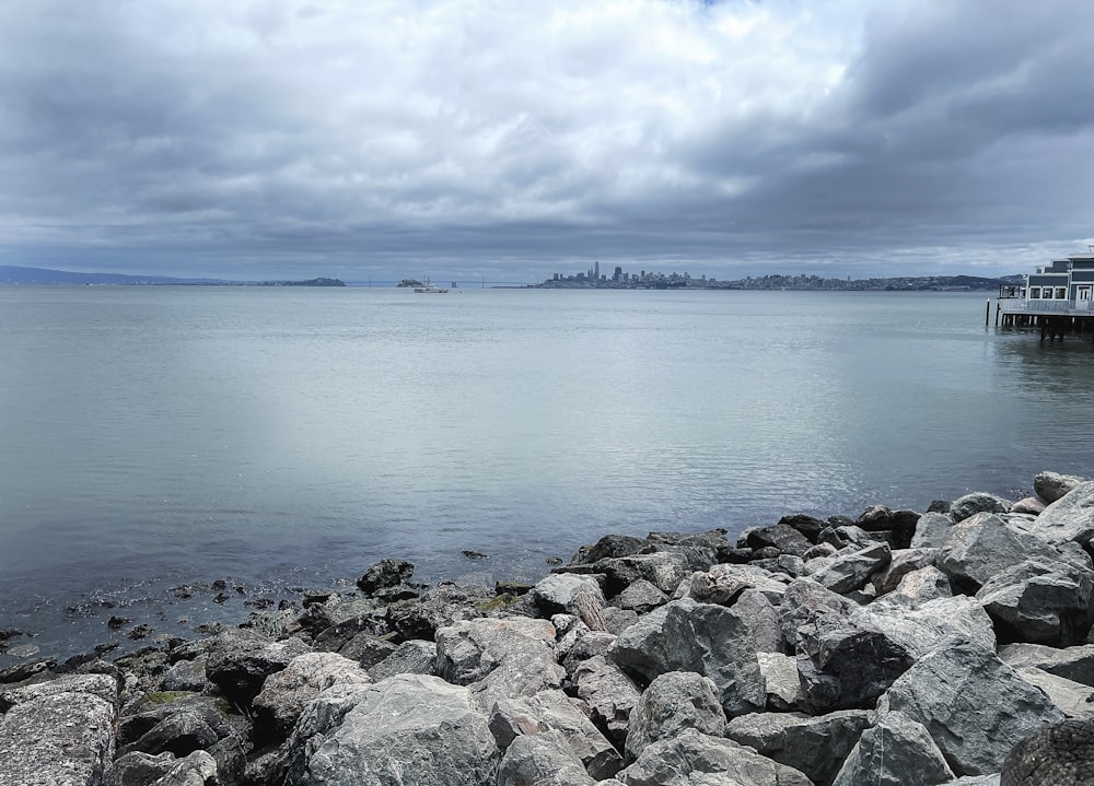 a large body of water surrounded by rocks