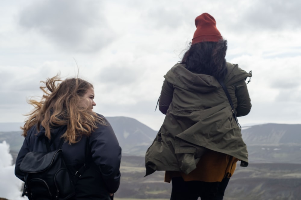 a couple of women standing next to each other