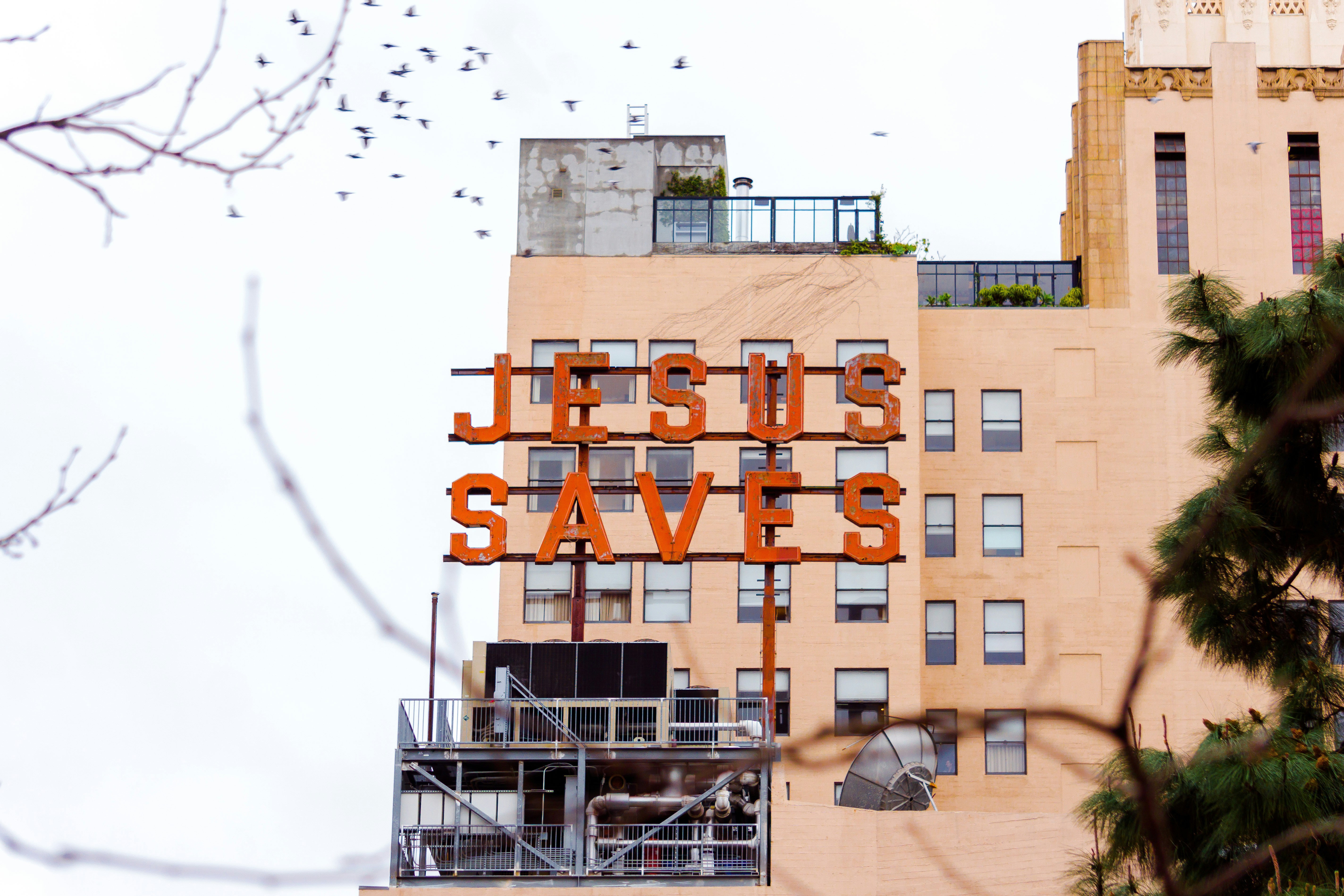 a building with a sign that says jesus saves