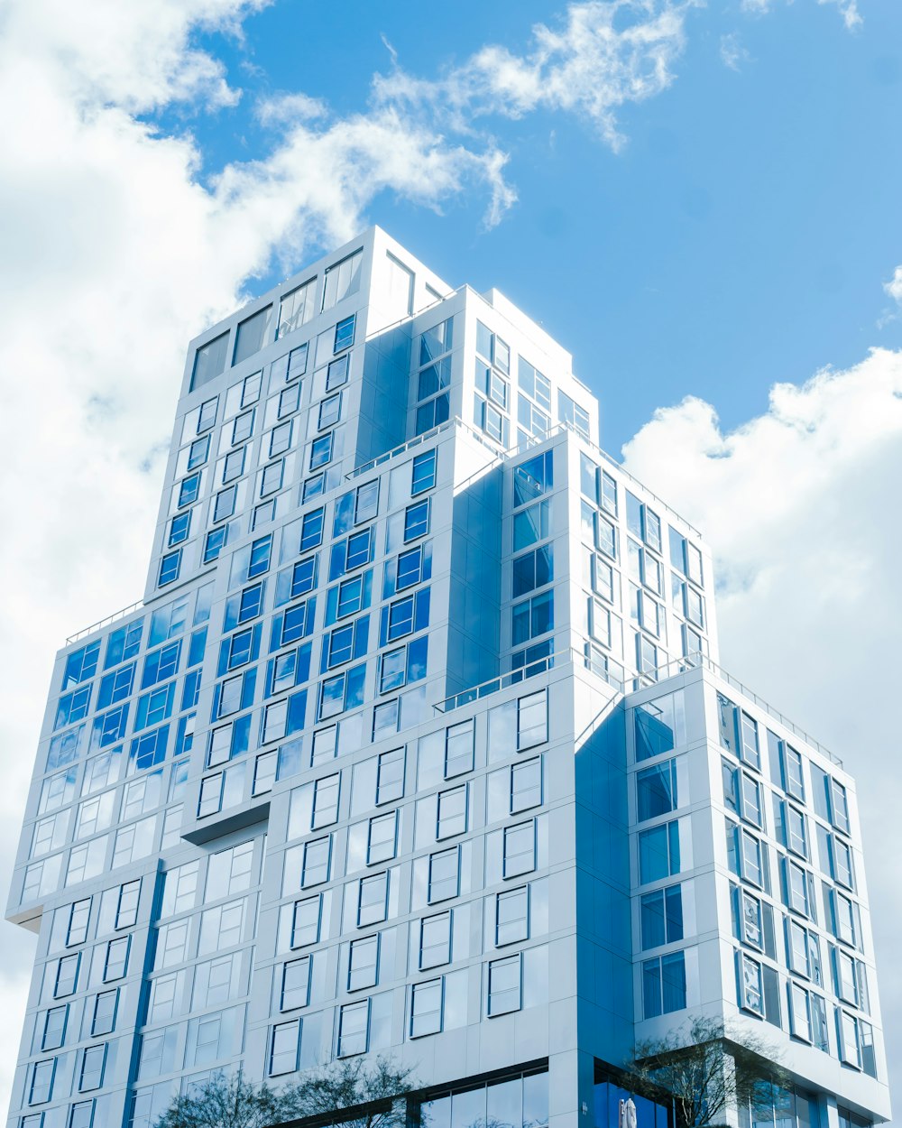 a very tall building with a sky background