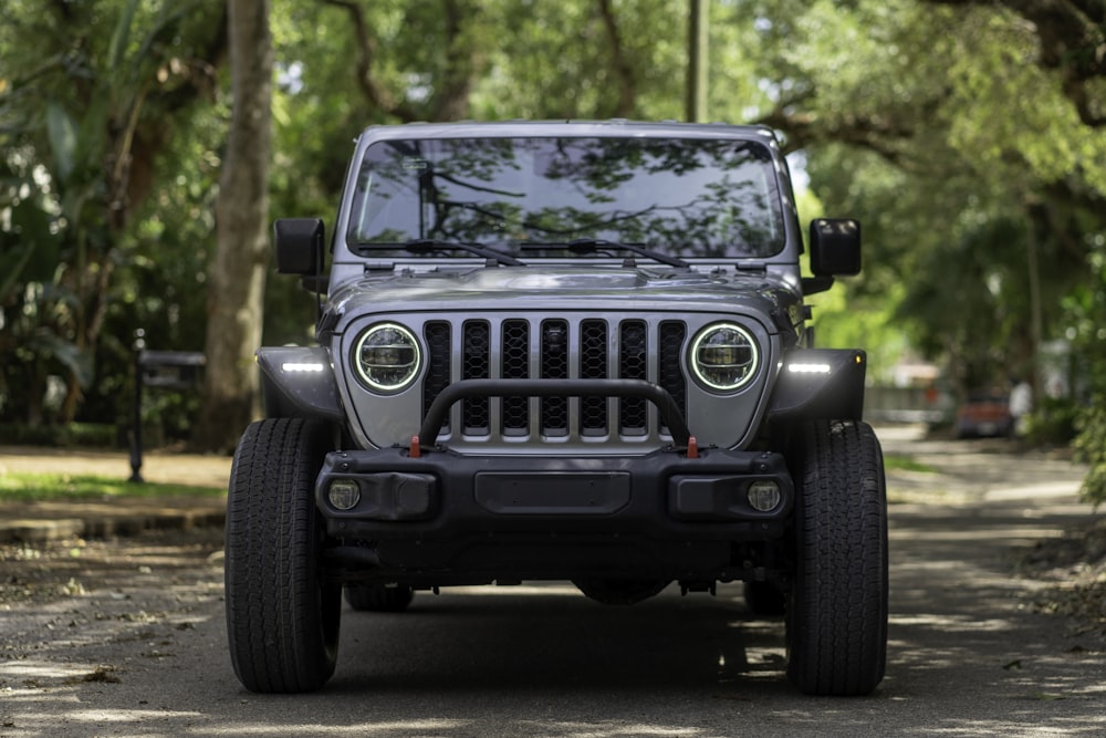 a jeep is parked on the side of the road