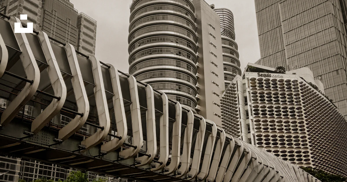 Really Long Building A very tall building with a very long roof photo – Free City Image on ...