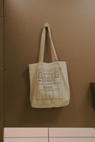 a canvas bag hanging on a wall
