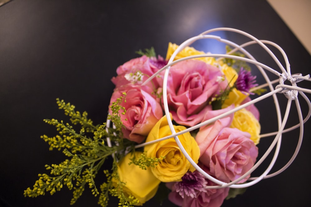 a bunch of flowers that are sitting on a table