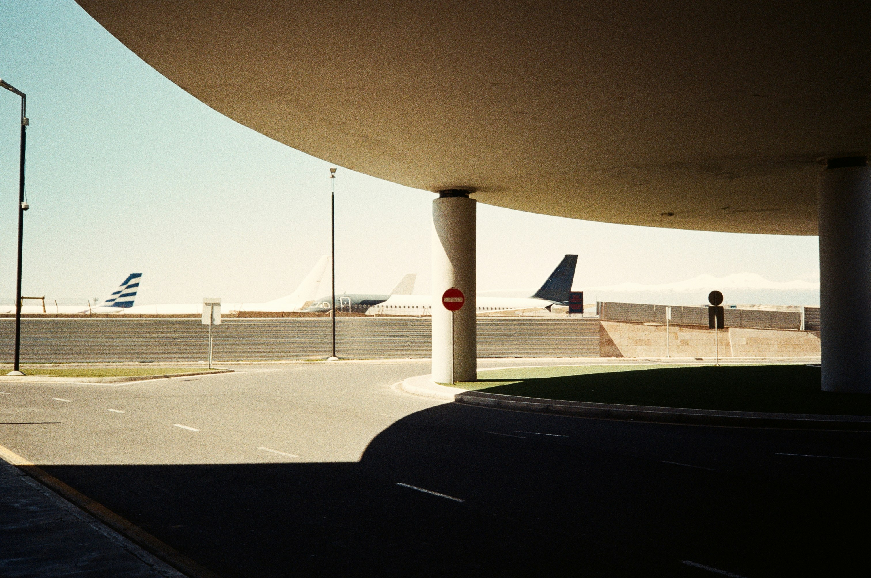 a view of an airport from a parking lot, 