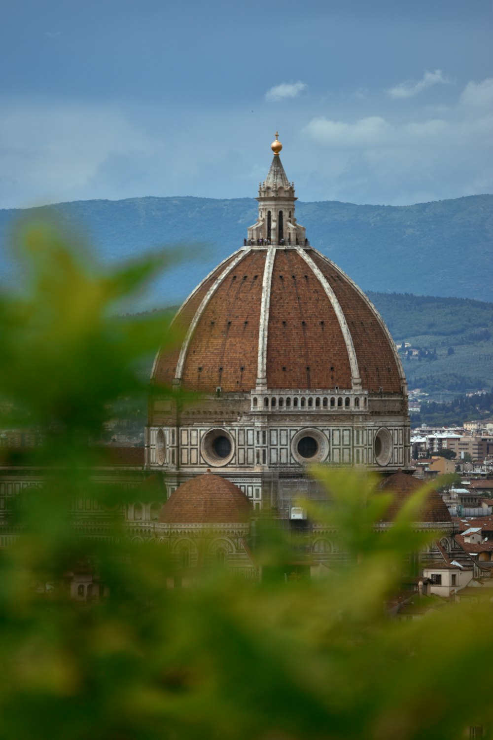 the dome of a building with a clock on it