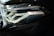 Close-up of a sleek car headlight featuring intricate design details and metallic accents. The headlight is part of a modern vehicle with a sophisticated lighting system, indicated by the 'BMW Laser' branding.