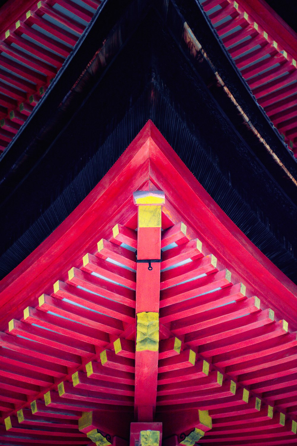 a close up of a red and yellow structure
