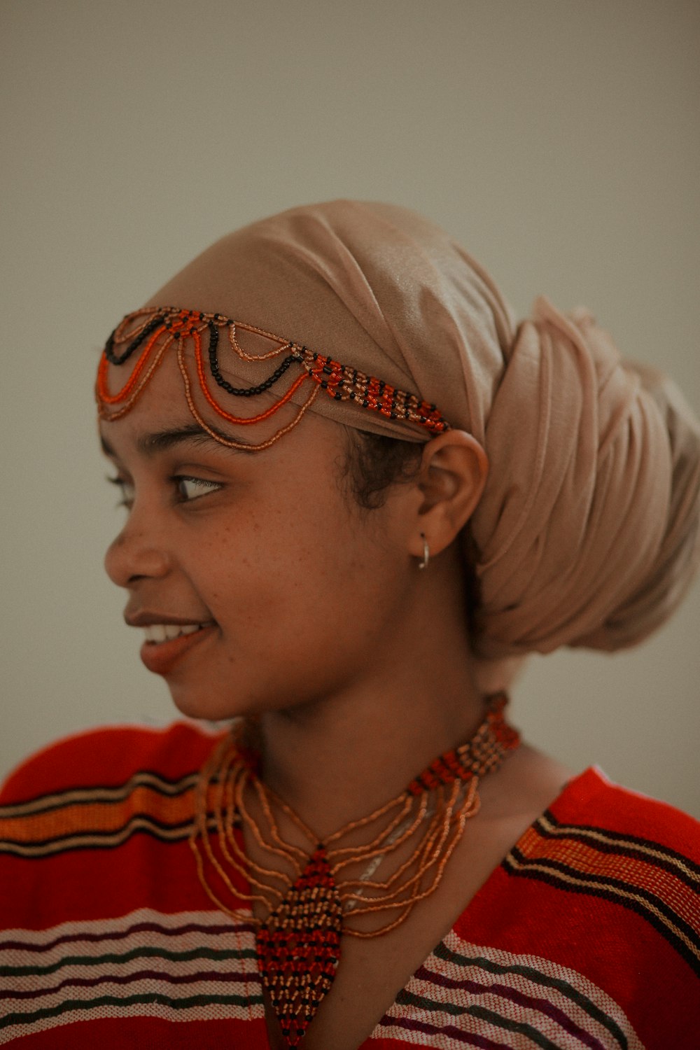 a woman with a turban on her head