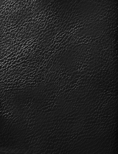 A textured surface with a pebbled, leather-like appearance. The surface has fine lines and ridges, creating a natural and organic look.
