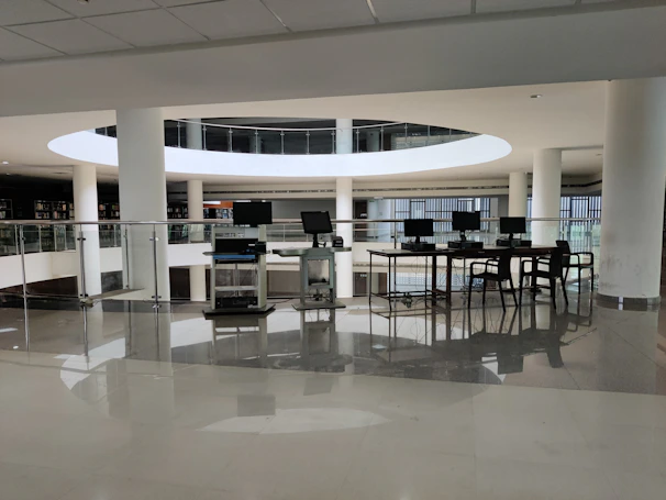 A modern digital library interface displaying student graduation projects with a clean blue and white color scheme.