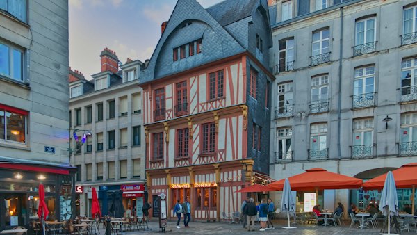 Half-timbered houses and café terraces in the old town — Nantes, France