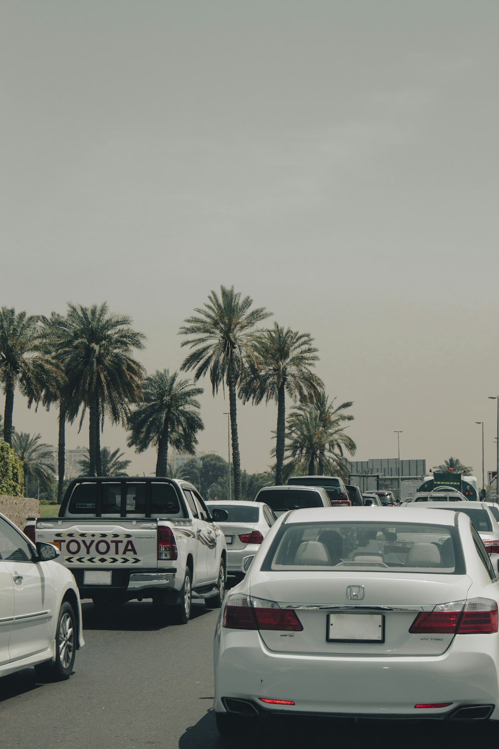 a lot of cars that are sitting in the street