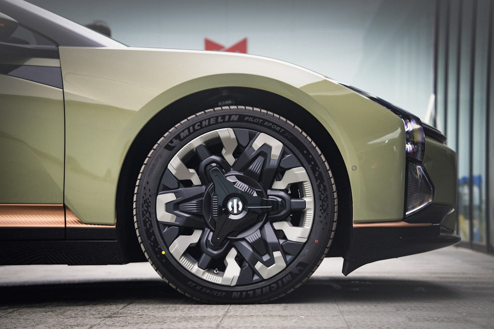 a close up of a car tire on a street