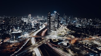 an aerial view of a city at night
