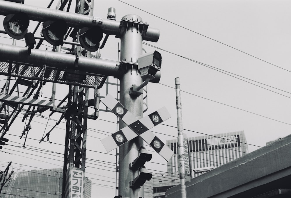 a black and white photo of a traffic light