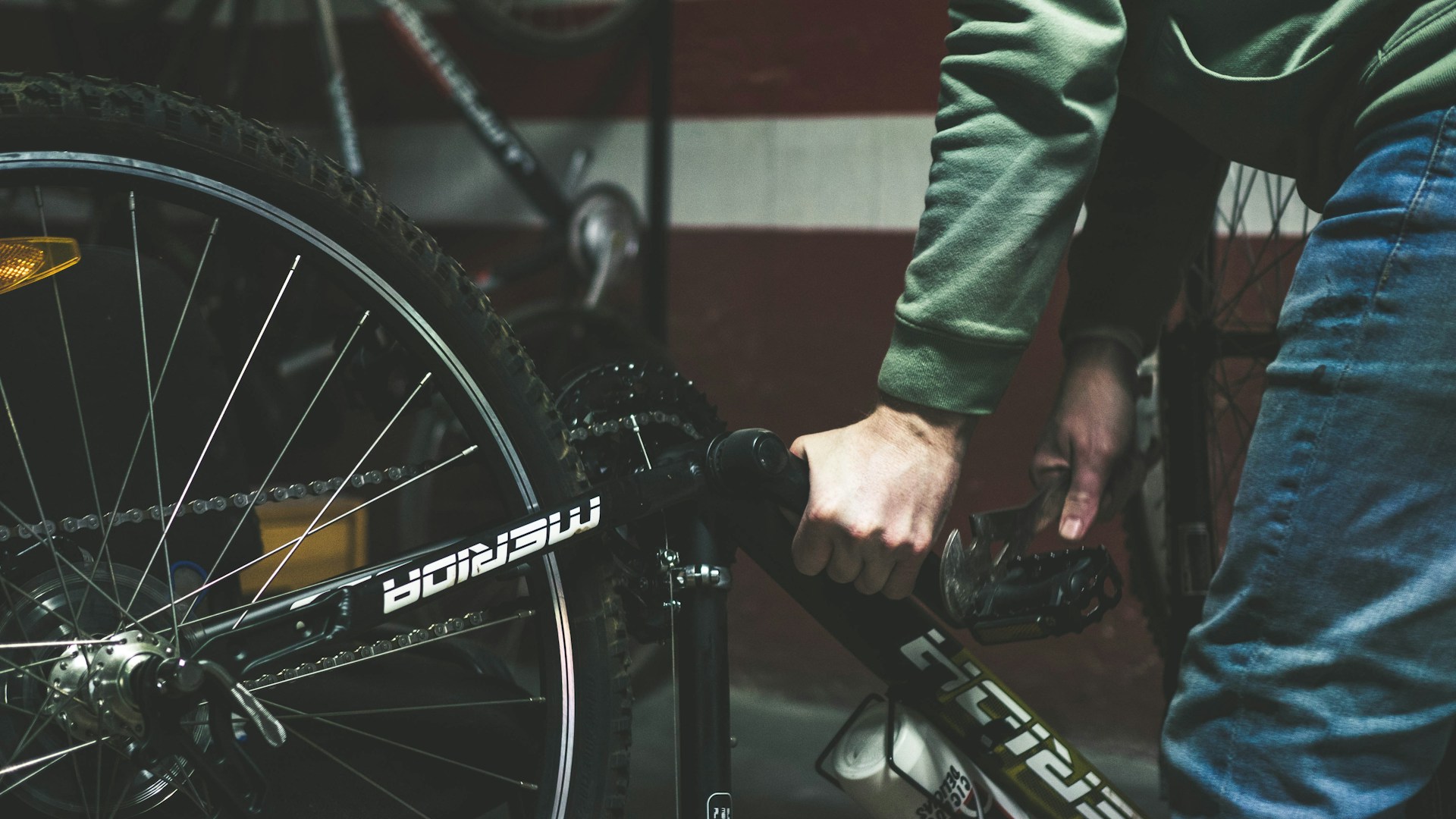 a close up of a person holding a bike