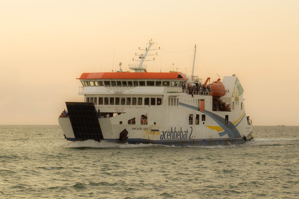 a large ferry boat in the middle of the ocean