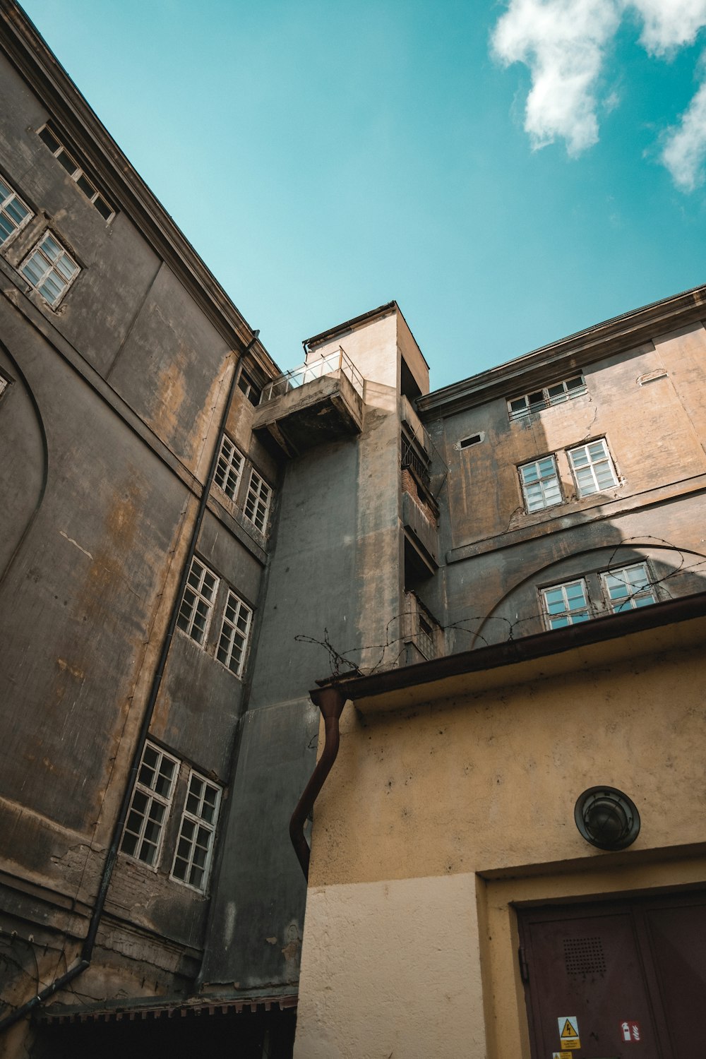 a tall building with a clock on the side of it