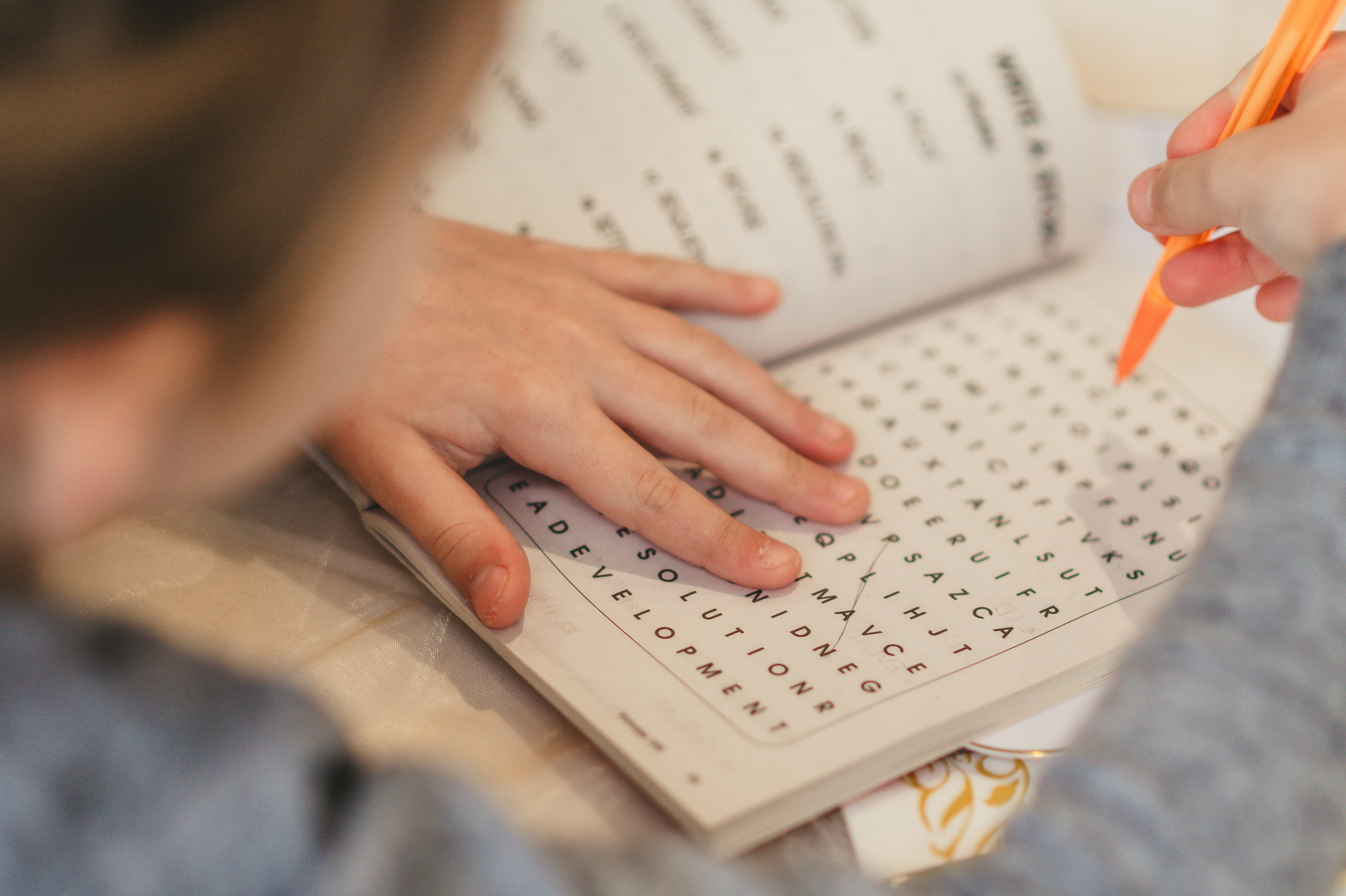 Child writing in notebook