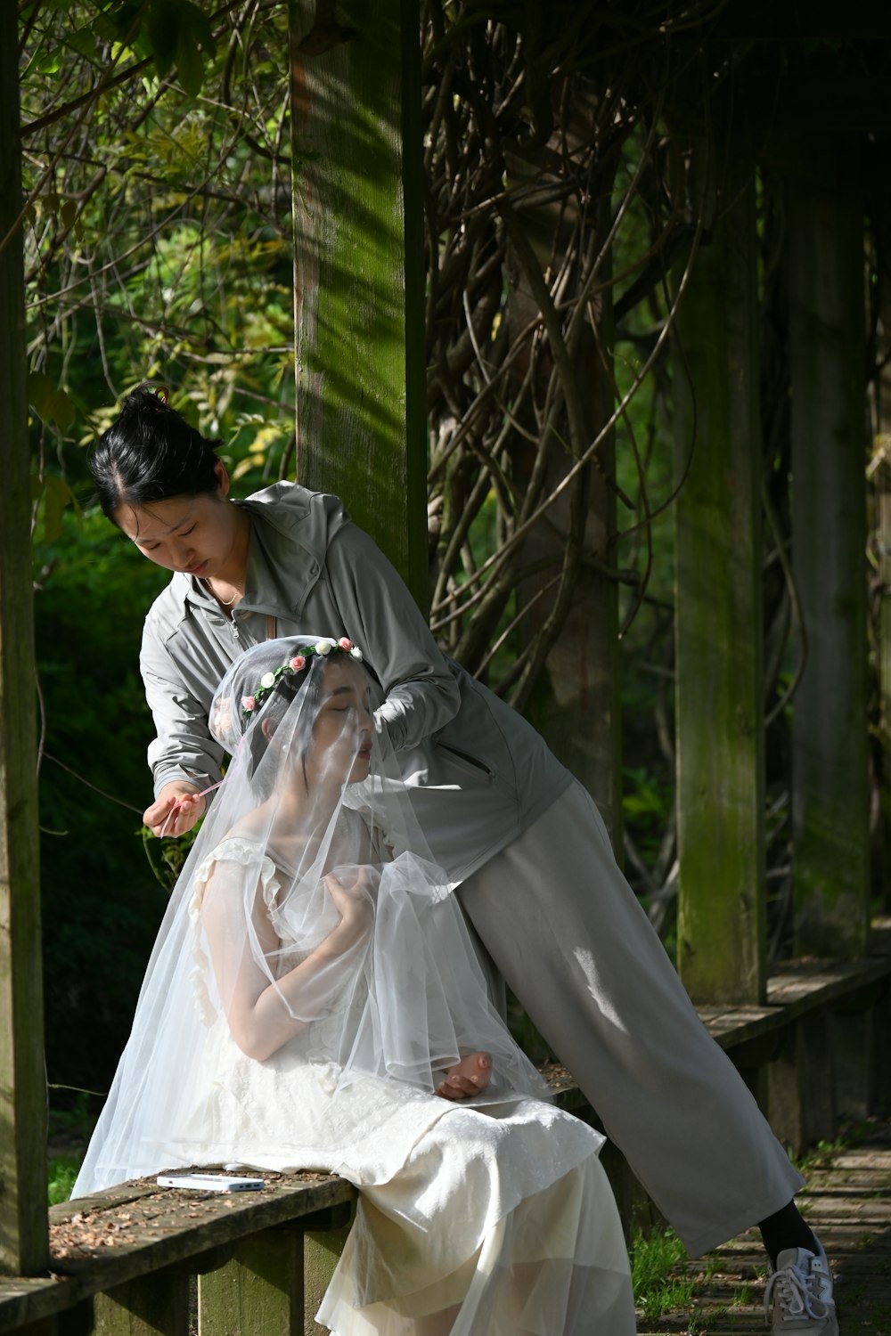 a woman in a white dress and a man in a gray suit