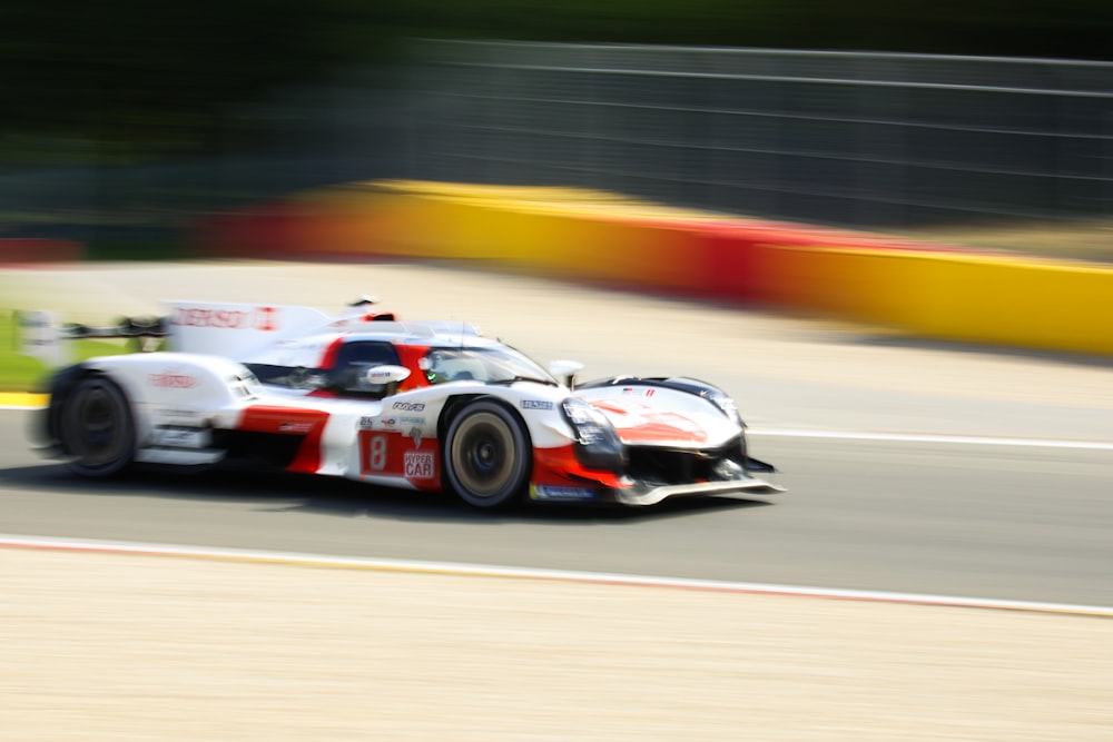 a race car driving down a race track