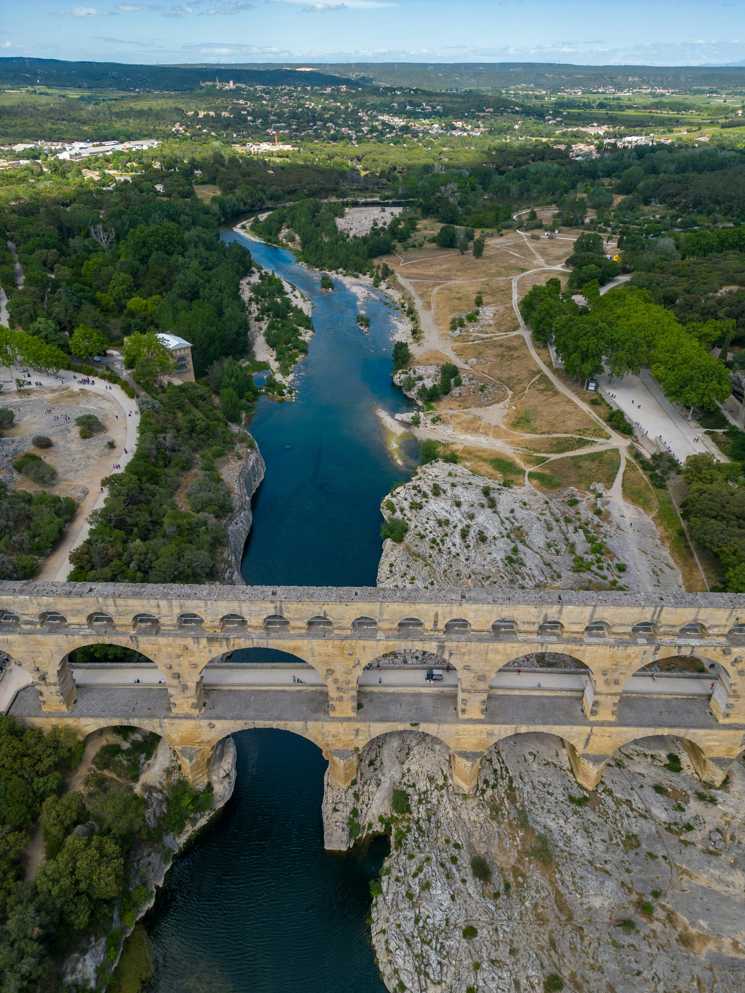 An aerial view of a bridge over a river photo – Free Bridge Image on ...