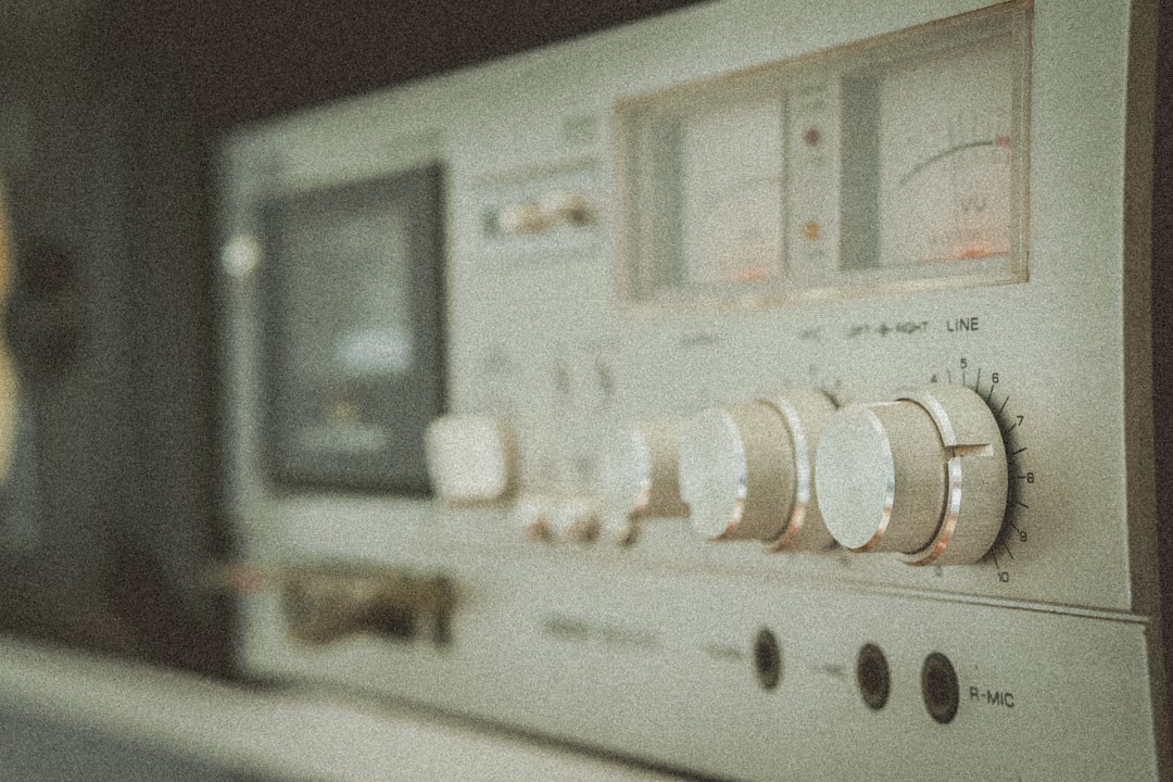 a close up of a radio with buttons and knobs,