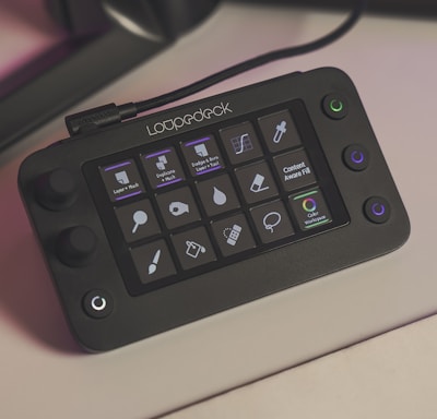 a computer keyboard sitting on top of a desk