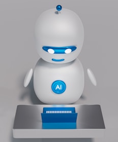 a white robot sitting on top of a table