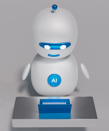 a white robot sitting on top of a table